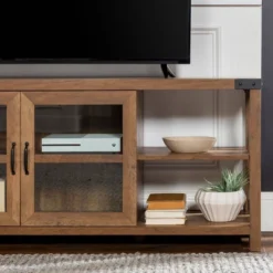 Sophie Rustic Farmhouse X Frame Glass Doors TV Stand For TVs Up To 80" Rustic Oak - Saracina Home 22 Sophie Rustic Farmhouse X Frame Glass Doors TV Stand For TVs Up To 80" Rustic Oak - Saracina Home -Saracina Home GUEST 08461d43 c3a2 4df9 90e5 c2fd20627359
